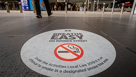 Smoke free sticker on Melbourne footpath