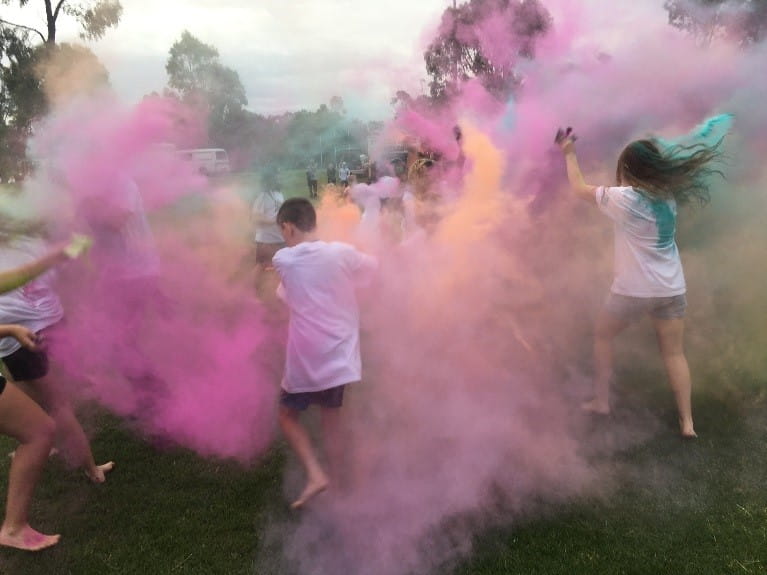 Teens participating in a colour run