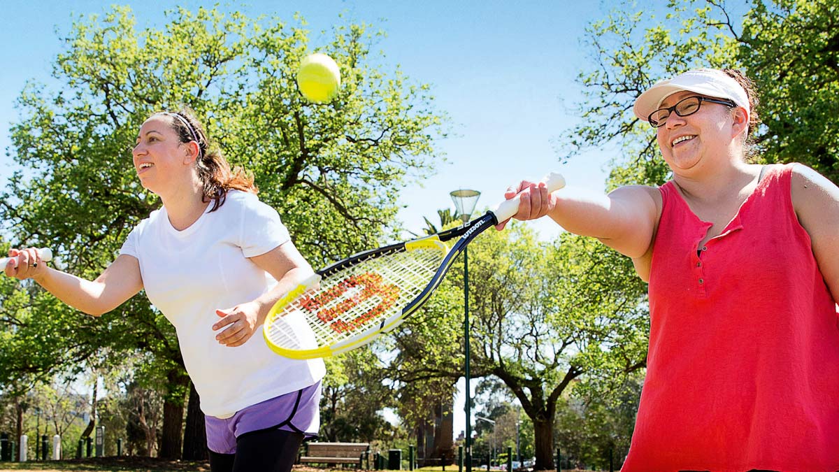 Three women playing cardio tennis