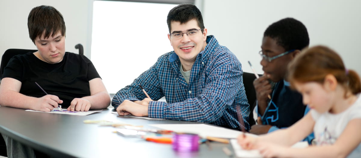 Young people with disabilities studying together