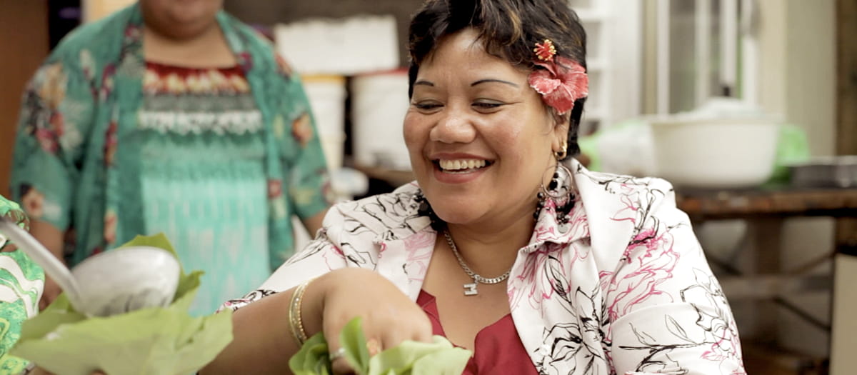 Samoan woman preparing food during filming for the series Meet and Eat