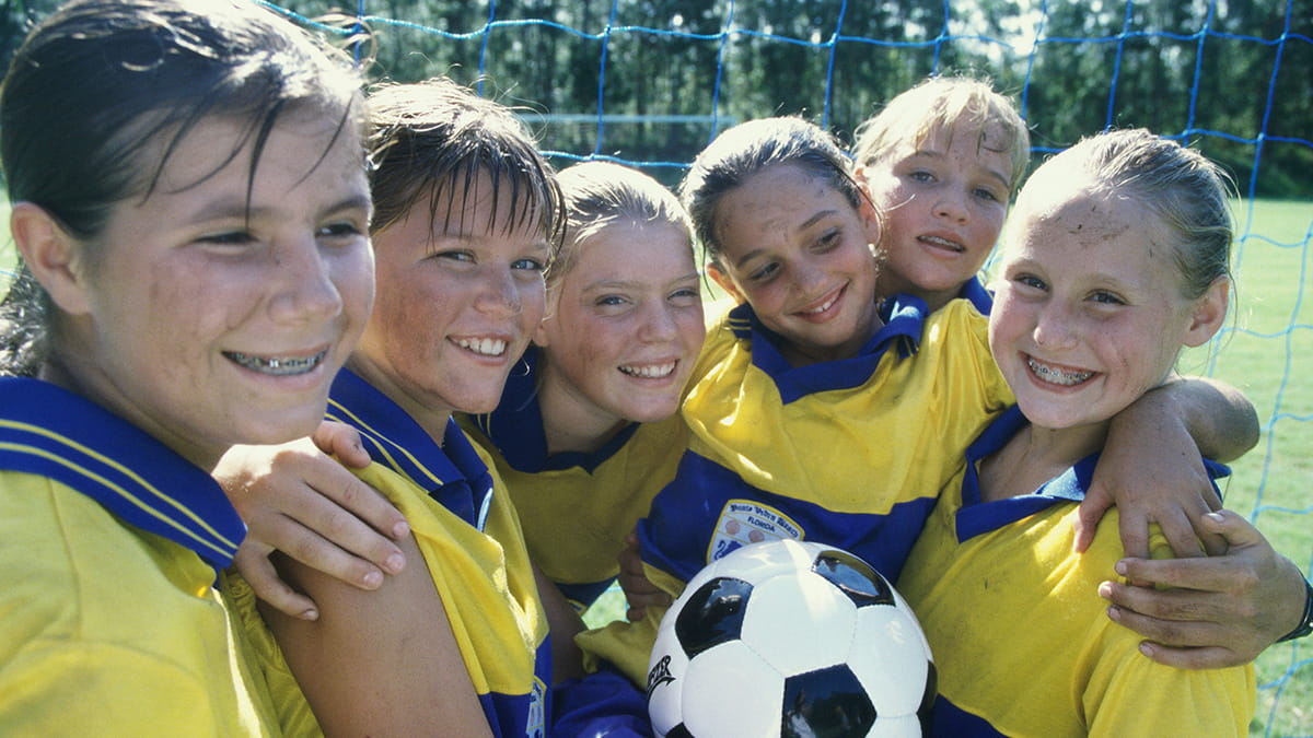 Female teammates together after a soccer match