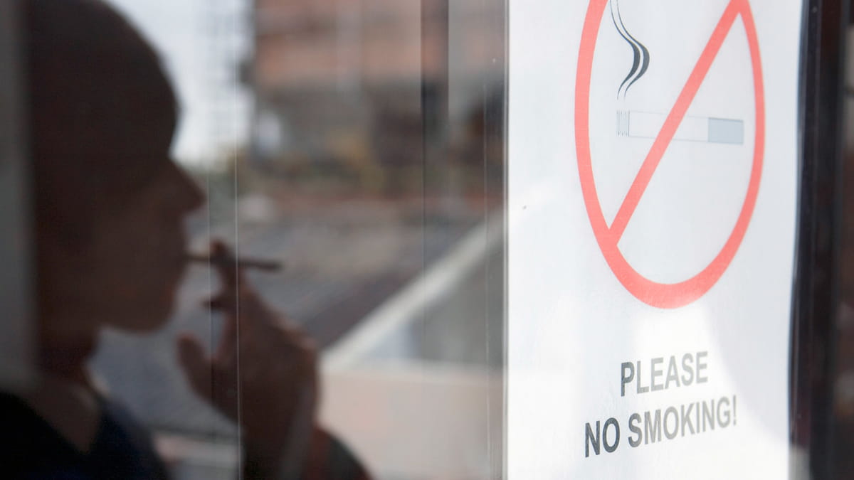 No smoking sign with a shadow of a person smoking