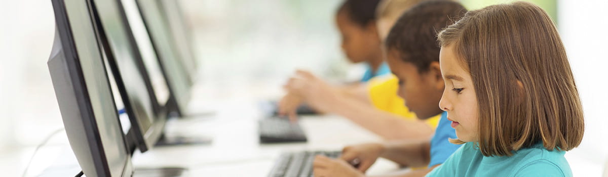 Children using computers at school