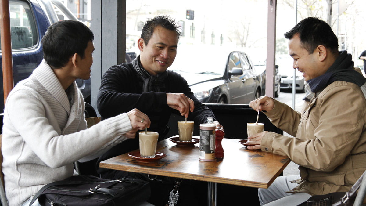 People drinking coffee at a cafe