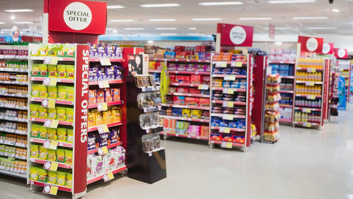 Supermarket shelves promoting unhealthy food specials