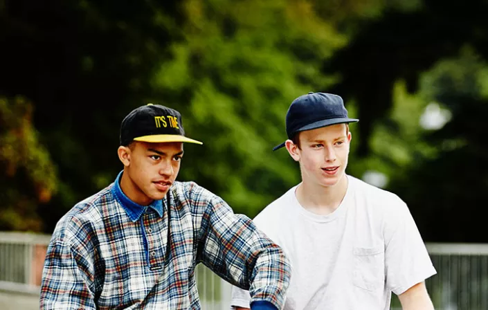Two young people with skateboards